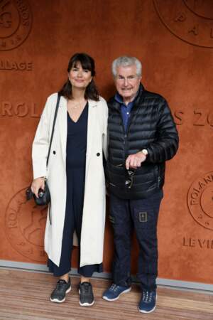 Claude Lelouch et sa compagne Valérie Perrin au village (jour 10) lors des Internationaux de France de Tennis de Roland Garros 2022 à Paris, France, le 31 mai 2022