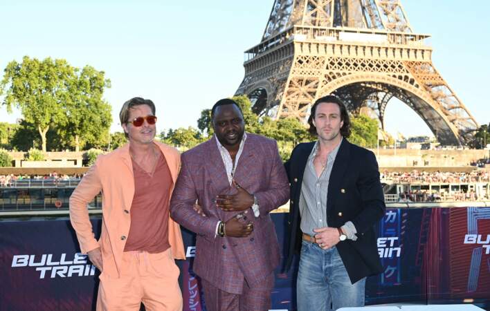 Brad Pitt, Brian Tyree Henry et Aaron Taylor-Johnson du films "Bullet Train", sur le bateau-mouche "L'Excellence" à Paris, le 16 juillet 2022