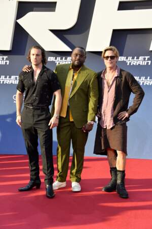 Aaron Taylor Johnson, Brian Tyree Henry et Brad Pitt à la première du film "Bullet Train", à Berlin, le 19 juillet 2022.