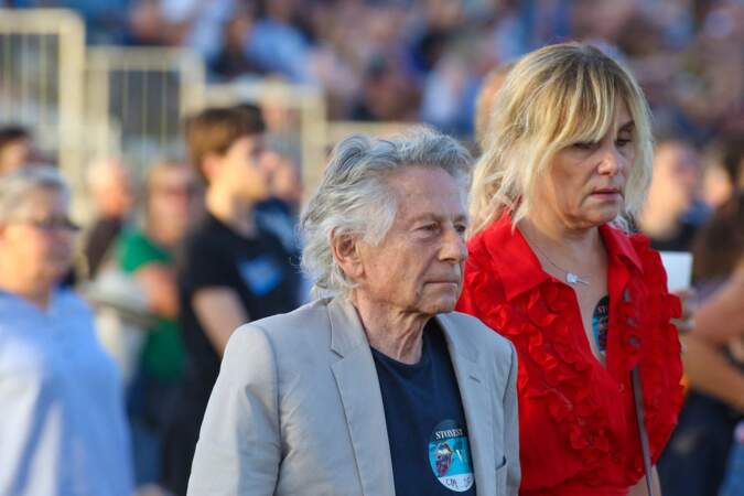 Roman Polanski et sa femme Emmanuelle Seigner lors du concert des Rolling Stones à l'hippodrome de Longchamp, ce samedi 23 juillet 2022. 