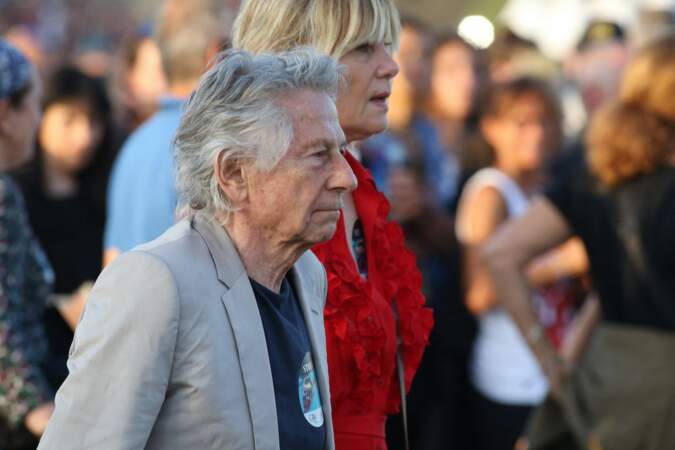 Roman Polanski et Emmanuelle Seigner profitent de la tournée anniversaire "Sixty" des Rolling Stones pour profiter de leur concert à l'hippodrome de Longchamp, ce samedi 23 juillet 2022. 
