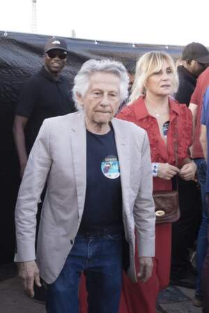 Emmanuelle Seigner ne lâche pas son mari Roman Polanski au concert des Rolling Stones, à l'hippodrome de Longchamp, ce samedi 23 juillet 2022. 