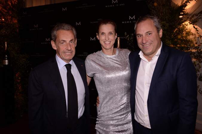 Nicolas Sarkozy en compagnie de l'homme de la soirée, Benjamin Patou, le PDG de Moma Group, et son épouse Emilie, ce 5 septembre