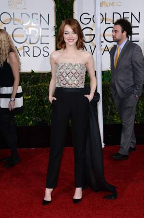 Emma Stone lance la tendance de la combinaison sur le tapis rouge des Golden Globes de 2015. Pour cela, l'actrice américaine porte une tenue à sequin signée Lanvin.