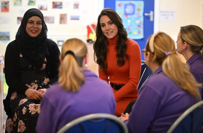Kate Middleton à l'écoute des membres de la crèche Foxcus, à Luton, le 18 janvier 2023