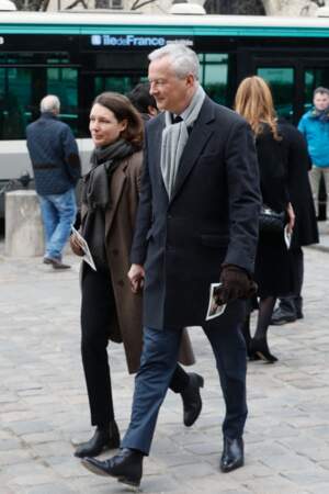 Bruno Le Maire et sa femme Pauline arrivant aux obsèques du  journaliste, patron de presse et critique de théâtre Philippe Tesson. Le 10 février 2023, à Paris. 