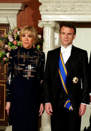 Le président de la République Emmanuel Macron et son épouse Brigitte Macron élégants pour le dîner d'État organisé en leur honneur au palais royal d'Amsterdam, le 11 avril 2023