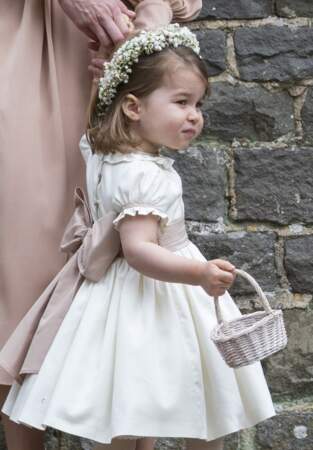 La princesse Charlotte en robe blanche et couronne de fleurs pour le mariage de Pippa Middleton et James Matthews, le 20 mai 2017