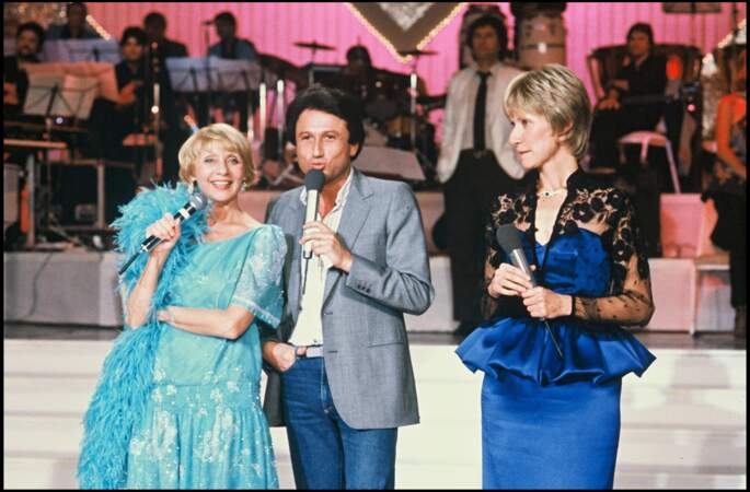 Daniele Gilbert (à droite) aux côtés d'Annie Cordy et de Michel Drucker sur le plateau de "Champs Élysées", en 1984.