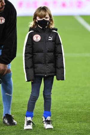Gabriella de Monaco en doudoune et baskets pour assister à un match de football caritatif au stade Louis II, le 24 janvier 2021