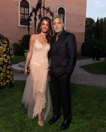 Amal et George Clooney à la cérémonie des "DVF Awards" lors du 80ème Festival International du Film de Venise 