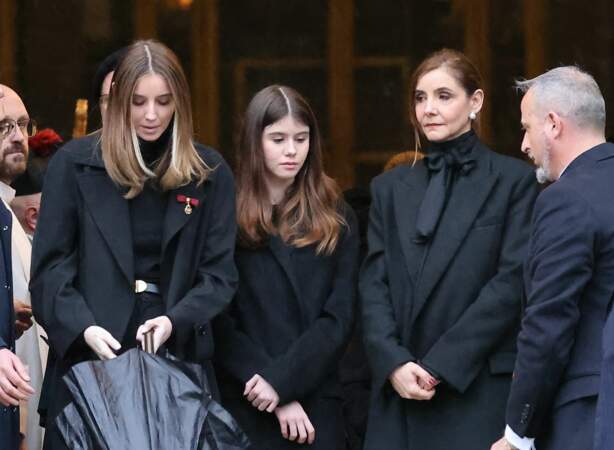 La princesse Clotilde Courau et ses filles, les princesses Louisa et Vittoria de Savoie à la sortie des funérailles du prince Victor Emmanuel de Savoie à la basilique de Superga, près de Turin le 10 février.