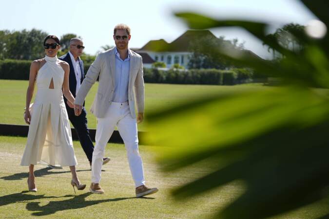 Meghan Markle et le Prince Harry main dans la main au Royal Salute Polo Challenge à Wellington en Floride le 12 avril 2024