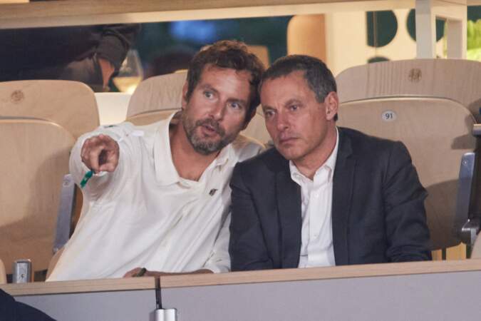François Roelants et son mari Marc-Olivier Fogiel - Personnalités dans les tribunes lors des Internationaux de France de tennis de Roland Garros 2024 à Paris. Le 29 mai 2024