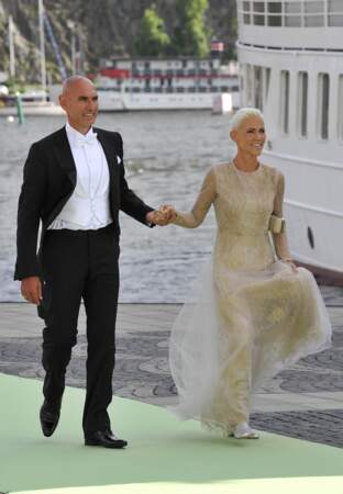 Marie Fredriksson et son mari Micke Bolyos lors du mariage de la princesse Madeleine de Suède avec Chris O'Neill au Palais Royal à Stockholm, le 8 juin 2013