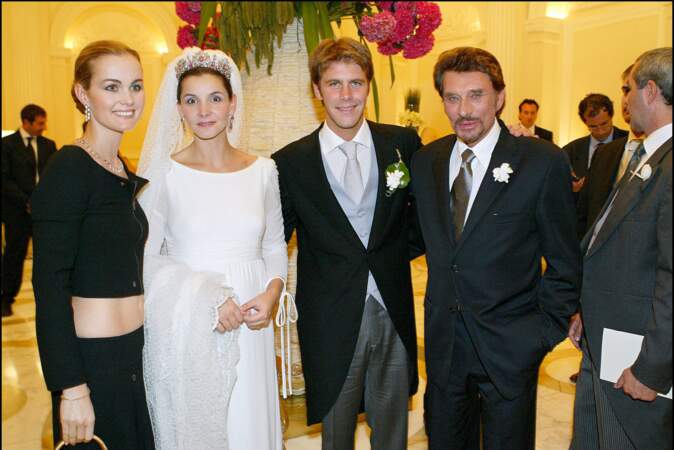 Johnny et Laeticia Hallyday aux côtés de Clotilde Courau et Emmanuel-Philibert de Savoie lors de leur mariage le 25 septembre 2003